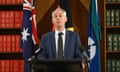 Minister for Immigration Andrew Giles speaks to media during a press conference, in Melbourne