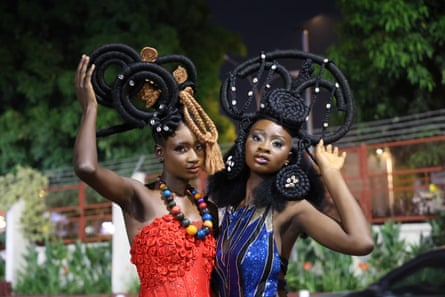 Models walk the runway during the Afro Hair Culture and Beauty festival in Abuja, Nigeria in 2025.