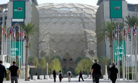 Passersby outside the Al Wasl dome at Expo City, Dubai, in the run-up to the Cop28 UN climate summit.