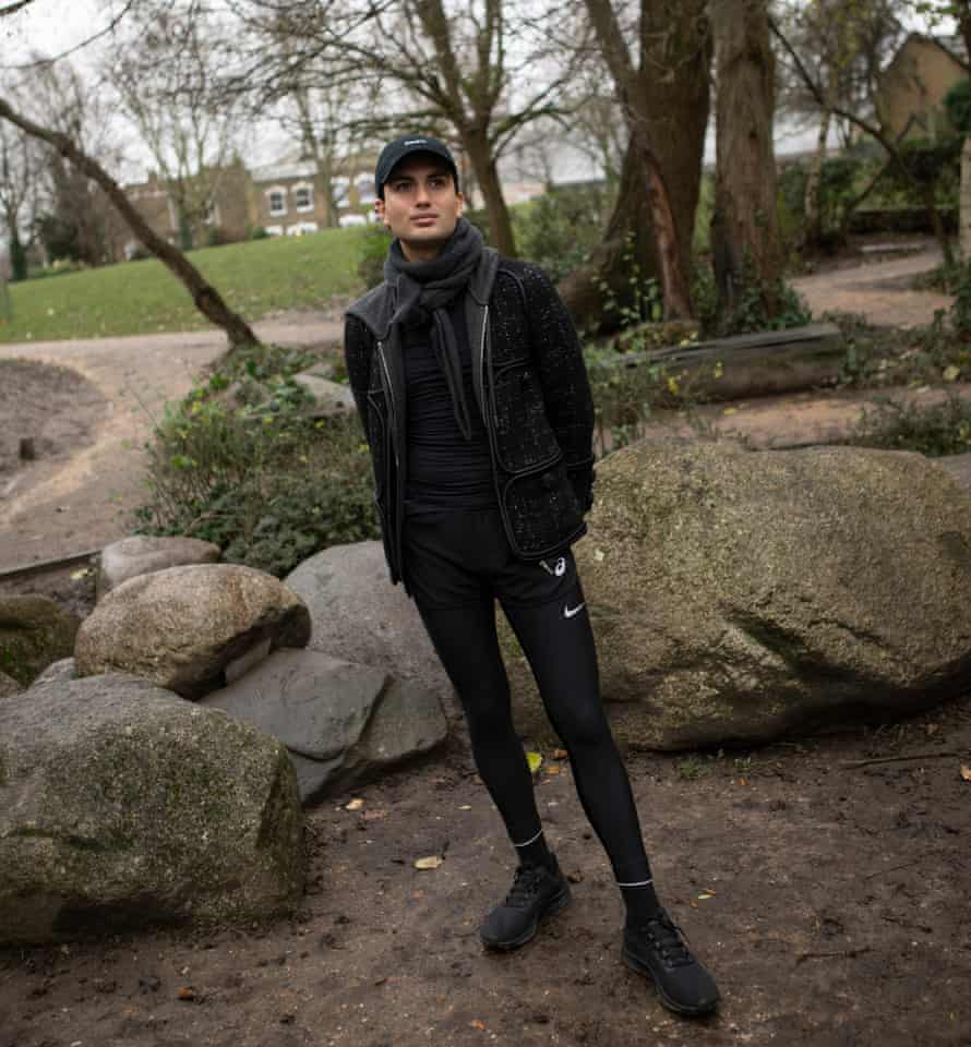 Osman Ahmed wearing black athleisure