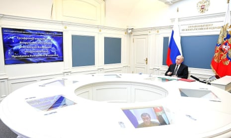 Russian president Vladimir Putin attends a nuclear attack drill via video conference in Moscow on October 25, 2023.  