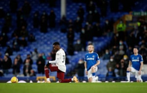 The players take a knee in support of Black Lives Matter in front of 2,000 fans at Goodison.