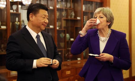 Theresa May and Chinese President Xi Jinping take part in a Tea Ceremony at Mr Jinping’s official Diaoyutai State Guesthouse