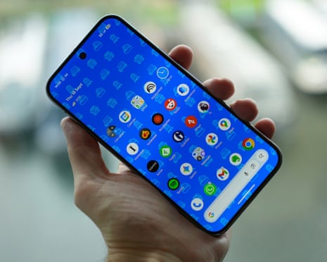 Google Pixel 10 Pro XL held in a hand showing the home screen
