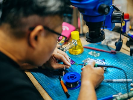 Tim, one of the Chinese volunteers, at his drone workshop.