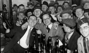 Alex Jackson in the pub he managed, the Angel & Crown Inn on St Martin’s Lane, in 1934.