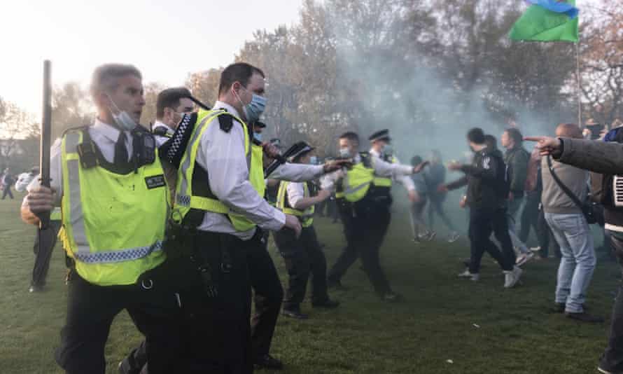Police and protesters clash after the protest at Hyde Park in London yesterday.