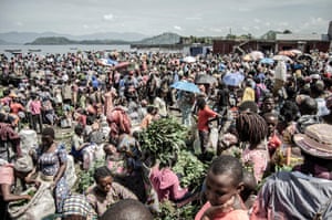 Vendors and shoppers at a market on the shores of Lake Kivu in Goma, eastern DRC, 2 April 2020.