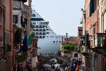 Venice, June 2019 MSC Magnifica is seen from one of the canals leading into the Venic
e Lagoon