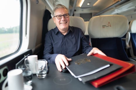 Prime minister Keir Starmer, travelling by train, to the Labour party conference.