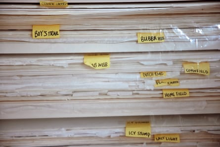 A stack of filed prints.