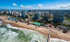 Aerial view of Durban beach front showing the piers extending into the sea. 