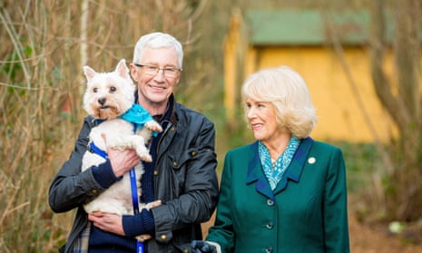 Paul O’Grady with Camilla queen consort on For The Love Of DogsMandatory Credit: Photo by ITV/REX/Shutterstock (13663194a)
Her Majesty Camilla Queen Consort of the United Kingdom (right) joins Battersea Ambassador Paul O'Grady (left) and George the West Highland White Terrier at Battersea Brands Hatch site in Kent
'Paul O'Grady: For the Love of Dogs ' TV Show, UK - 19 Dec 2022
ITV celebrates 160 years of Battersea Dogs & Cats Home with a one-off special episode of the award-winning series, Paul O'Grady: For the Love of Dogs. The episode features Her Majesty The Queen Consort, a long term supporter of Battersea and self-confessed dog-lover, hosting a celebratory event at Clarence House and later helping Paul care for some of the abandoned dogs searching for a new forever home.
