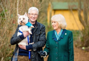 Camilla, the Queen Consort, with O’Grady and George the West Highland White Terrier, at the Brands Hatch site of Battersea Dogs and Cats Home in December 2022.
