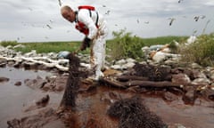 Oil Spill<br>FILE- In this June 4, 2010 file photo, a worker picks up blobs of oil with absorbent snare on Queen Bess Island at the mouth of Barataria Bay near the Gulf of Mexico in Plaquemines Parish, La. Nearly $10 million in 2010 oil spill money is rebuilding the barrier island bird rookery off Louisiana. Work on Queen Bess Island had to wait for this year’s nesting season to end in August and must finish by late February or early March, before the next nesting season. The island, which was heavily hit by oil from the Deepwater Horizon spill, supports Louisiana’s third-largest brown pelican nesting colony.  (AP Photo/Gerald Herbert, File)