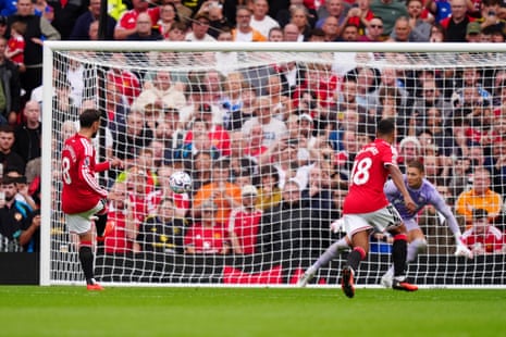 Manchester United's Bruno Fernandes scores their side's third goal of the game from a penalty.