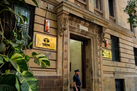 the door of a brown building