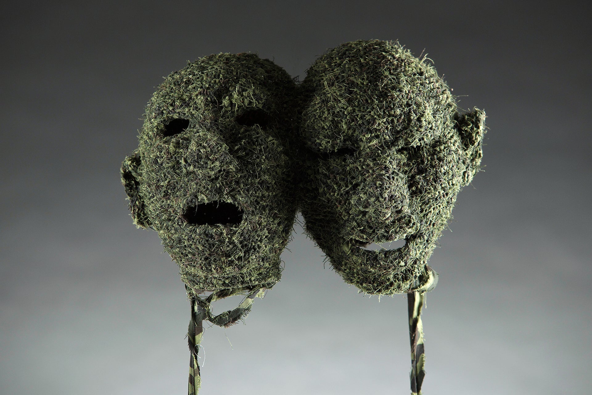 All The King’s Men (2014–15) by Fiona Hall, comprising knitted military uniforms, wire, animal bone, horns and teeth, dice, glass, leather boxing gloves, pool ball. Photograph: Clayton Glen