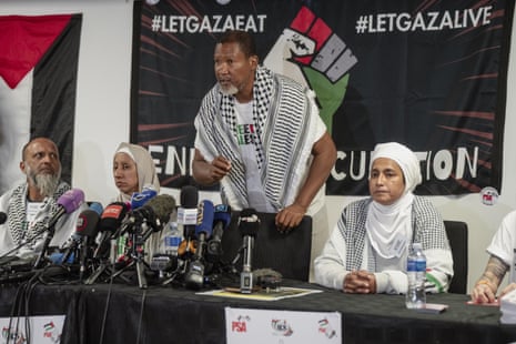 Mandla Mandela, grandson of Nelson Mandela, (C) speaks at a press conference after arriving at the OR Tambo airport on Wednesday with five other South African activists who were on board the Global Sumud Flotilla, which was attacked and detained by Israeli army in international waters.