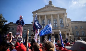 Trump supporters at a ‘Stop the Steal’ rally outside of the Georgia state capitol on 21 November.