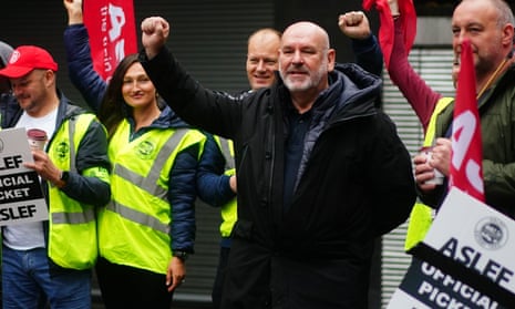 Mick Whelan, general secretary of Aslef, on a picket line at Euston station in London. 