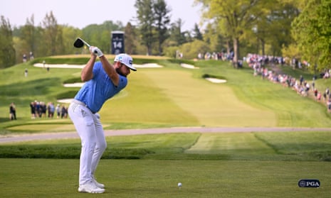 Tyrrell Hatton on the way to making birdie at 14.