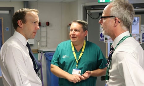 The health secretary, Matt Hancock; Nick Jenkins, West Suffolk hospital’s medical director, and Stephen Dunn, chief executive of West Suffolk NHS foundation trust.