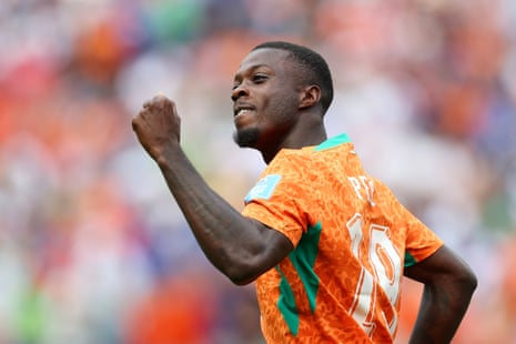 Nicolas Pepe celebrates after opening the scoring and giving Cote d'Ivoire the lead.