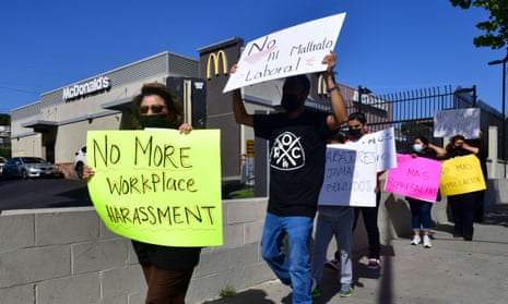 McDonald's employees protest outside their workplace in April 2021 in Los Angeles.\