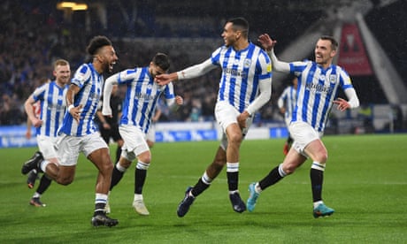 Russell and Sarr lift Huddersfield to third as Luton pay penalty for miss