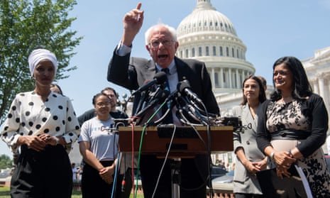 Sanders with Alexandria Ocasio-Cortez, Ilhan Omar and Pramila Jayapal. Data shows nations are not on track to limit the dangerous heating of the planet significantly enough.