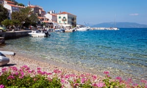 pink flowers boats and seafront at Valun Cres Island