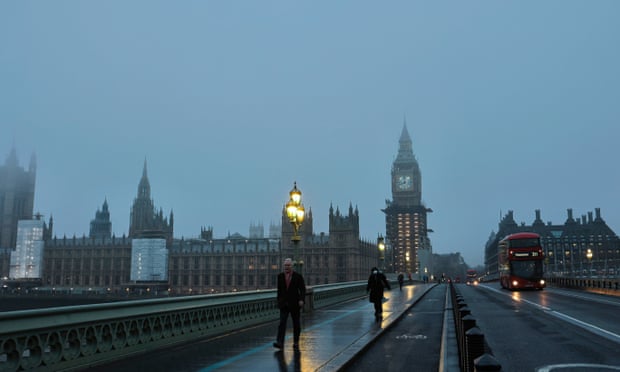 A view of the Big Ben and the Houses of Parliament on a foggy morning