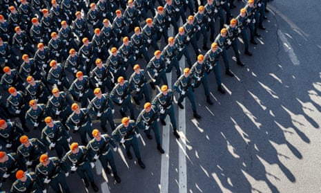 Service personnel prepare for the parade.