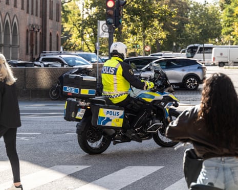 A Swedish police motorcycle is near Christiansborg Palace ahead of the informal meeting of European Union leaders in Copenhagen, Denmark.
