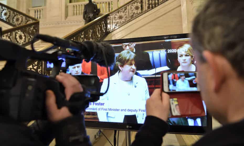 Journalists watch a live feed of proceedings at Stormont on Saturday