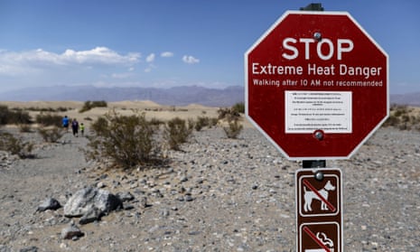 A sign in Death Valley national park warns visitors of extreme heat danger. 
