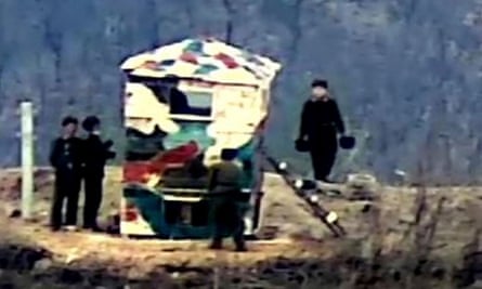 A photo released by the South Korean Defence Ministry in 2023 shows North Korean soldiers rebuilding a guard post on the north side of the Demilitarised zone.
