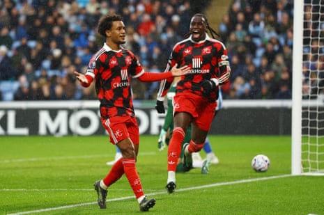 Fulham’s Oscar Bobb celebrates with a teammate after scoring a goal