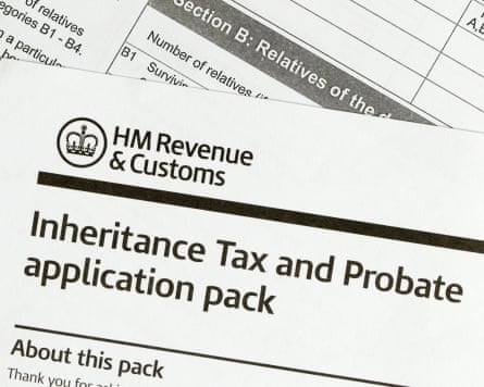 Closeup of overlapping HM Revenue and Customs forms titled Inheritance Tax and Probate application pack