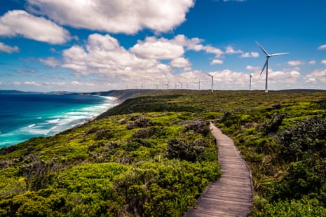 A windfarm along a shoreline