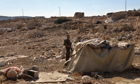 Israeli reservist soldiers are seen at the abandoned Palestinian&nbsp;village Zanuta, in the south Hebron hills.