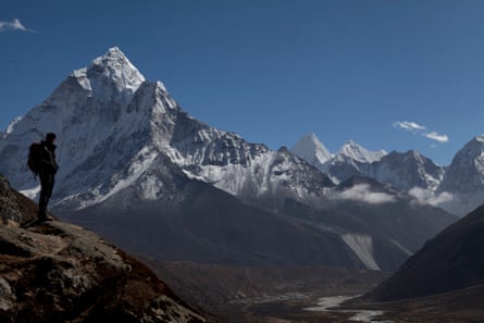 A trekker in the Himalayas, Nepal.