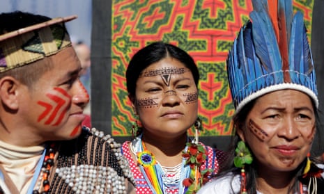 Indigenous people from the Mesoamerican Alliance of Peoples and Forests protest outside the UN climate change conference in Marrakech, Morocco