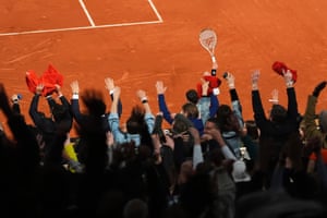 France’s Arthur Rinderknech joins in with the fans’ Mexican wave during his first round match against Jannik Sinner