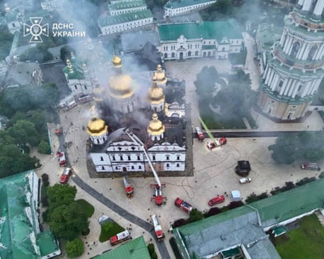 Firefighters extinguishing a fire in the Dormition Cathedral in the Orthodox complex of the Kyiv Pechersk Lavra.