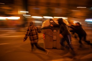 Protesters block the passage of police vans in Barcelona last week
