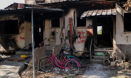 childrens bikes in front of burned house