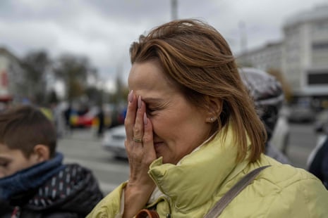 A woman reacts to the liberation of Kherson.