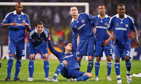 Chelsea players watch a pivotal moment in the 2008 Champions League final.